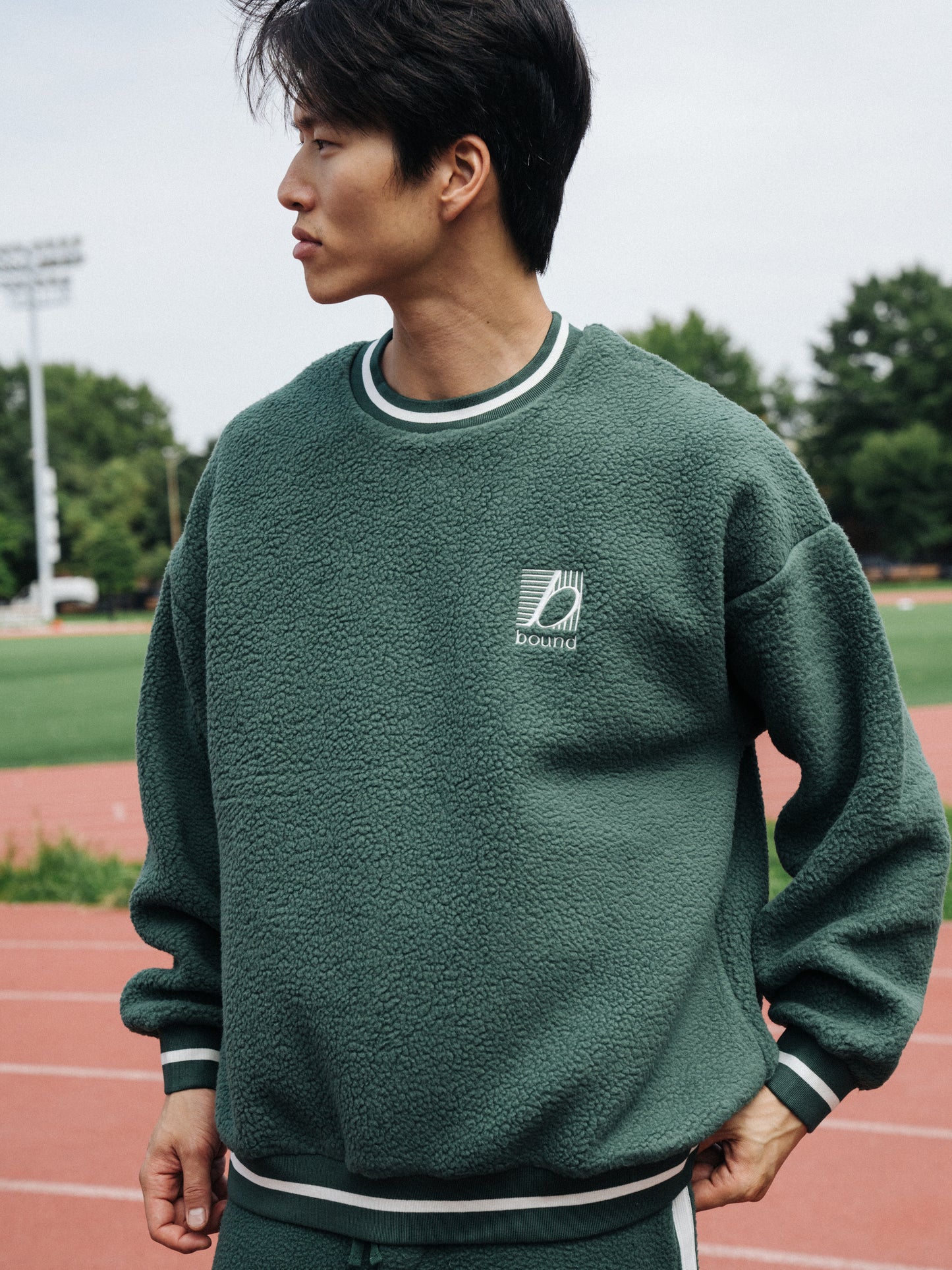 REVERSE FLEECE GRID SWEATER  - BOTTLE GREEN