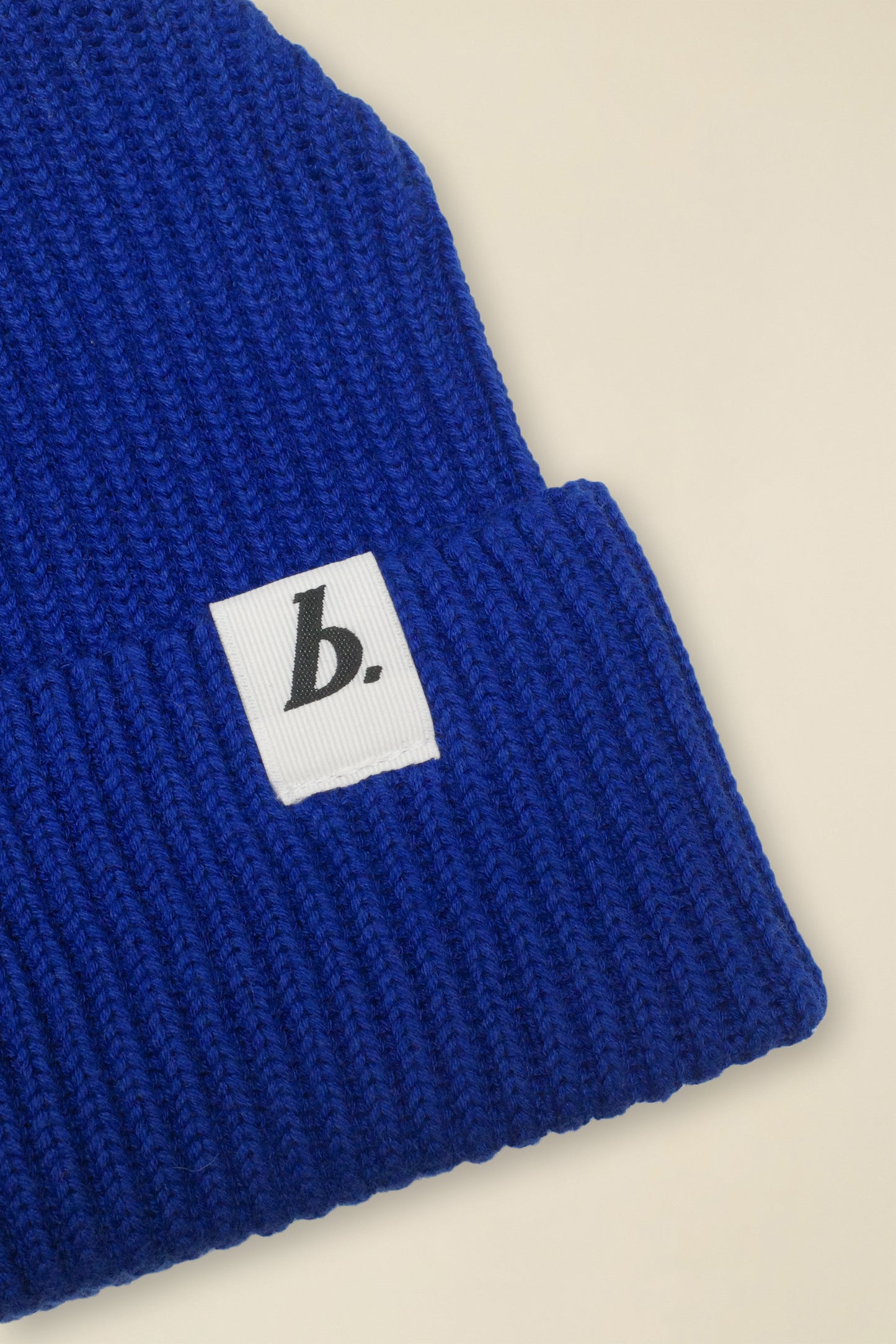 ORGANIC FISHERMAN RIBBED LABEL BEANIE - BLUE