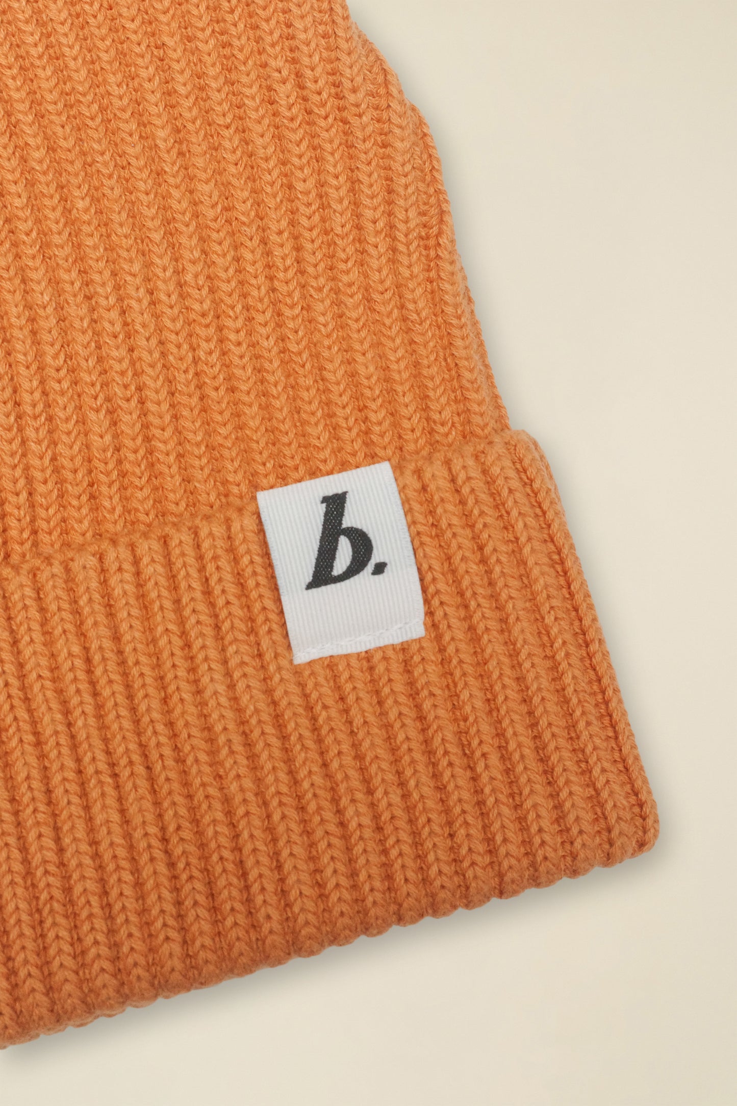 ORGANIC FISHERMAN RIBBED LABEL BEANIE - AMBER