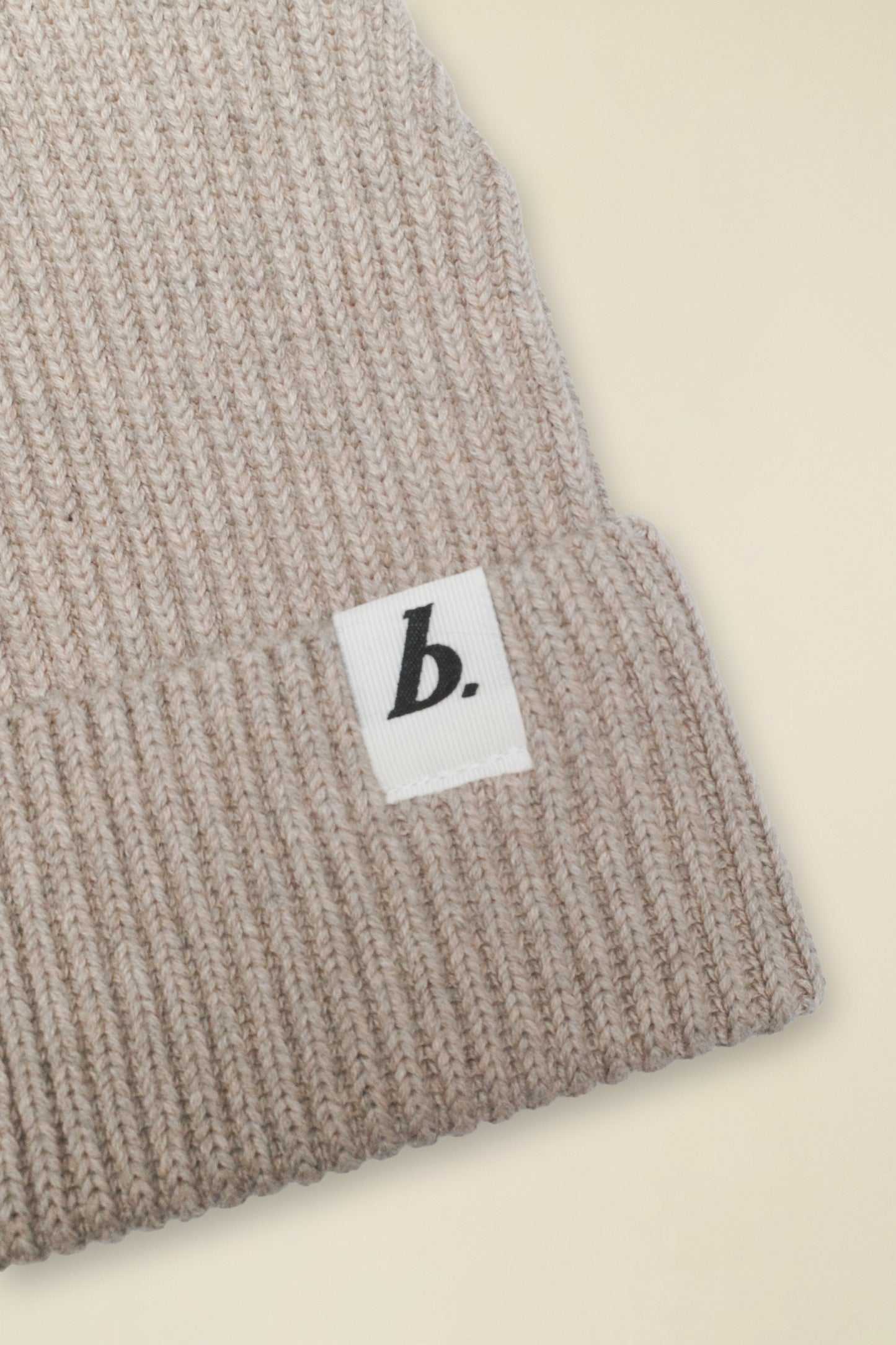 ORGANIC FISHERMAN RIBBED LABEL BEANIE - SAND