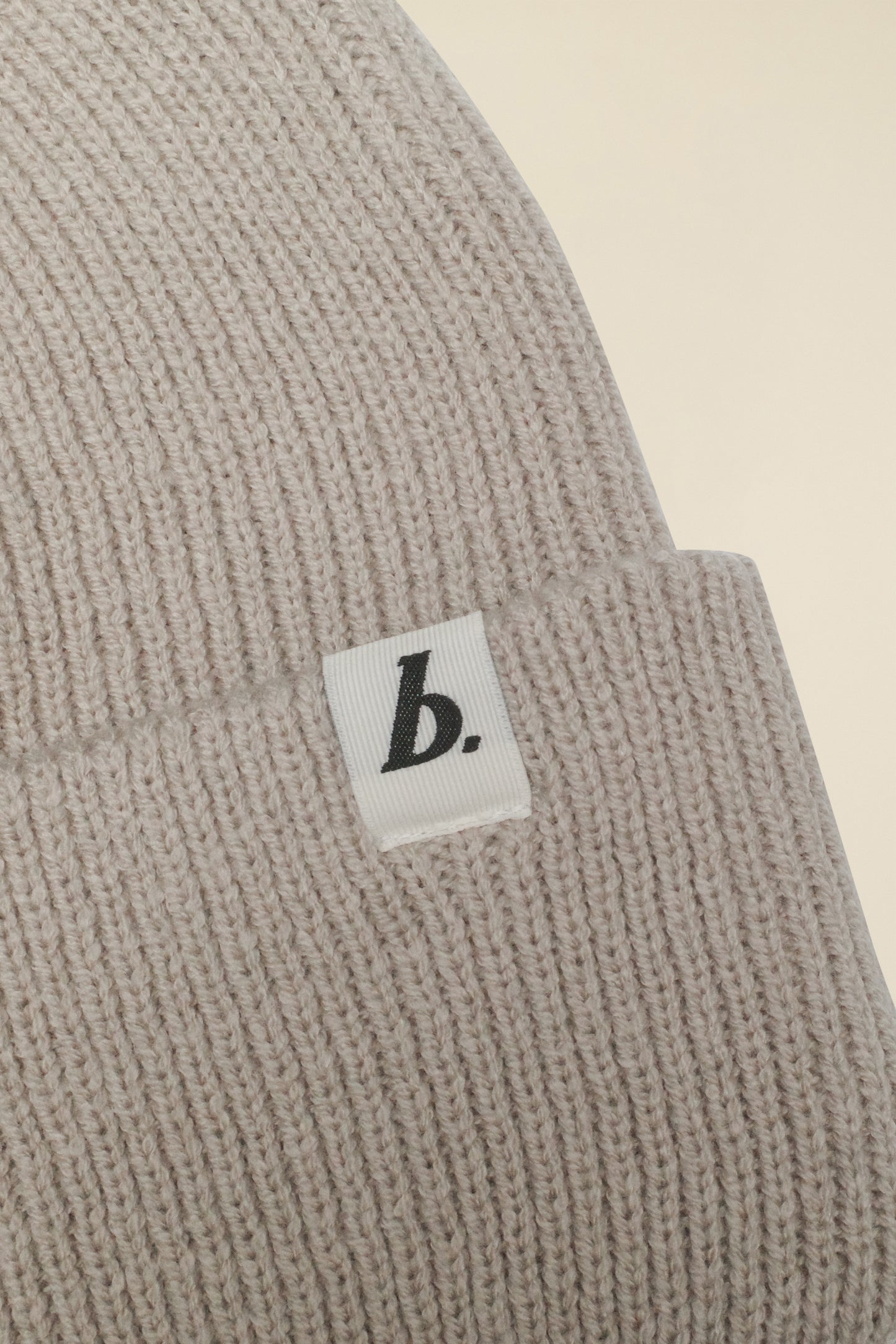 OVERSIZED RECYCLED CUFFED LABEL BEANIE - STONE