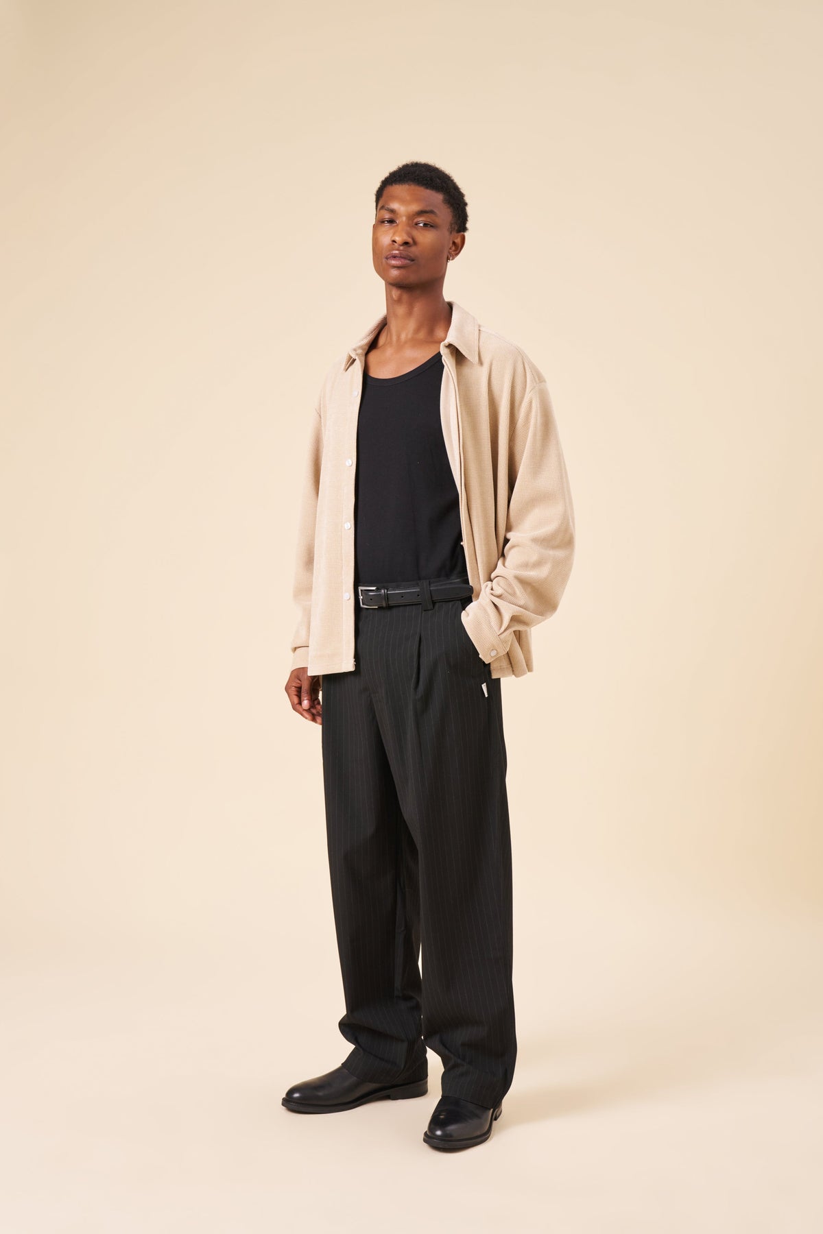PIN STRIPE RELAXED PLEATED TROUSERS - BLACK